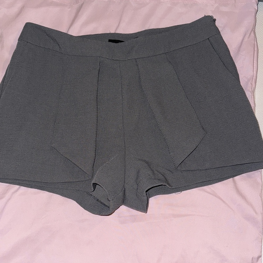 Grey skort, front side skirt appearance, back side short appearance